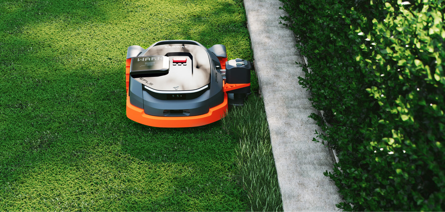 Segway Navimow i105E robot lawn mower trimming a green lawn.