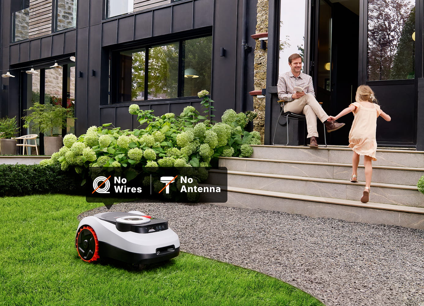 Navimow i110N robot lawn mower mows the green garden grass.