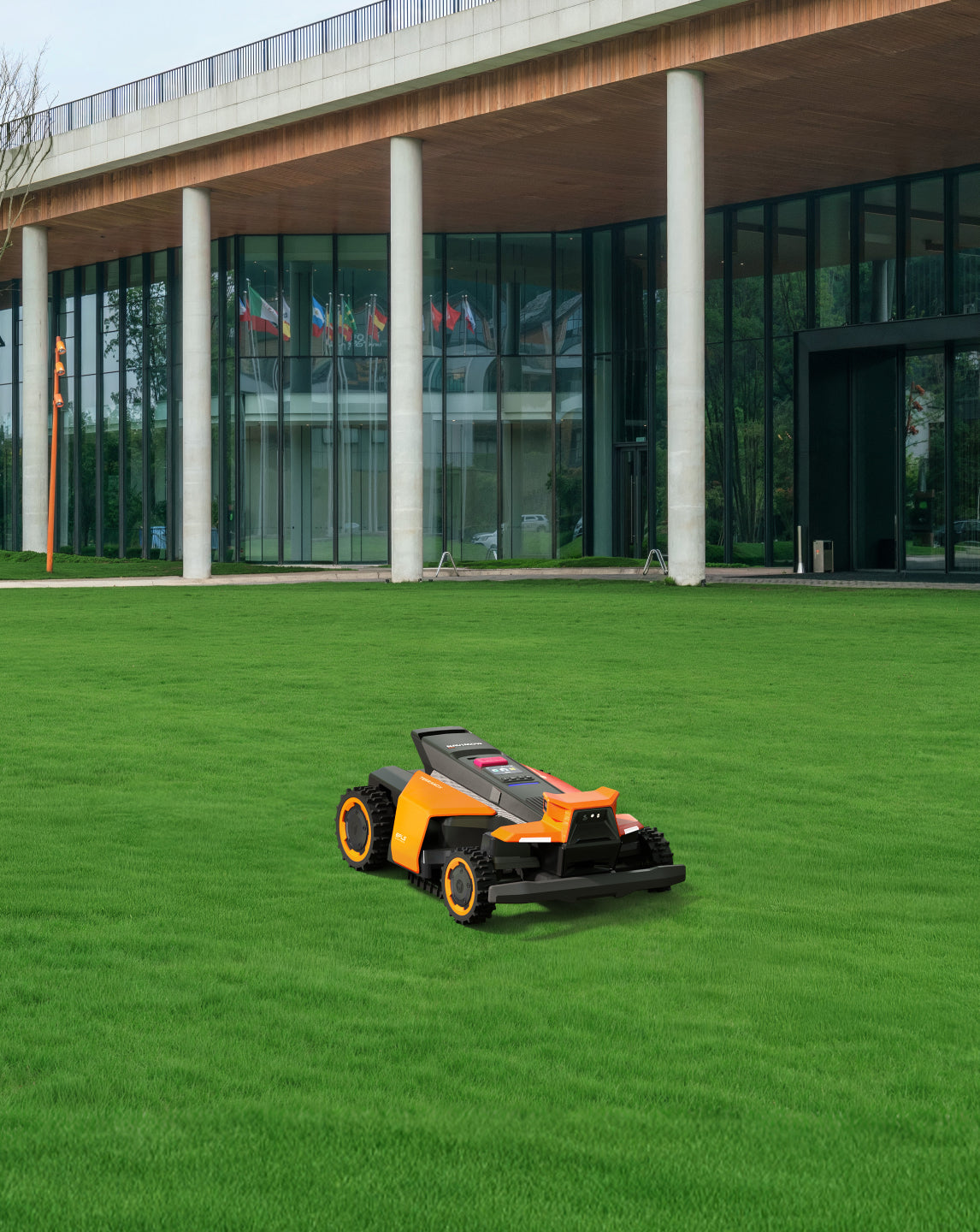 Navimow i110N robot lawn mower on a lush green field.