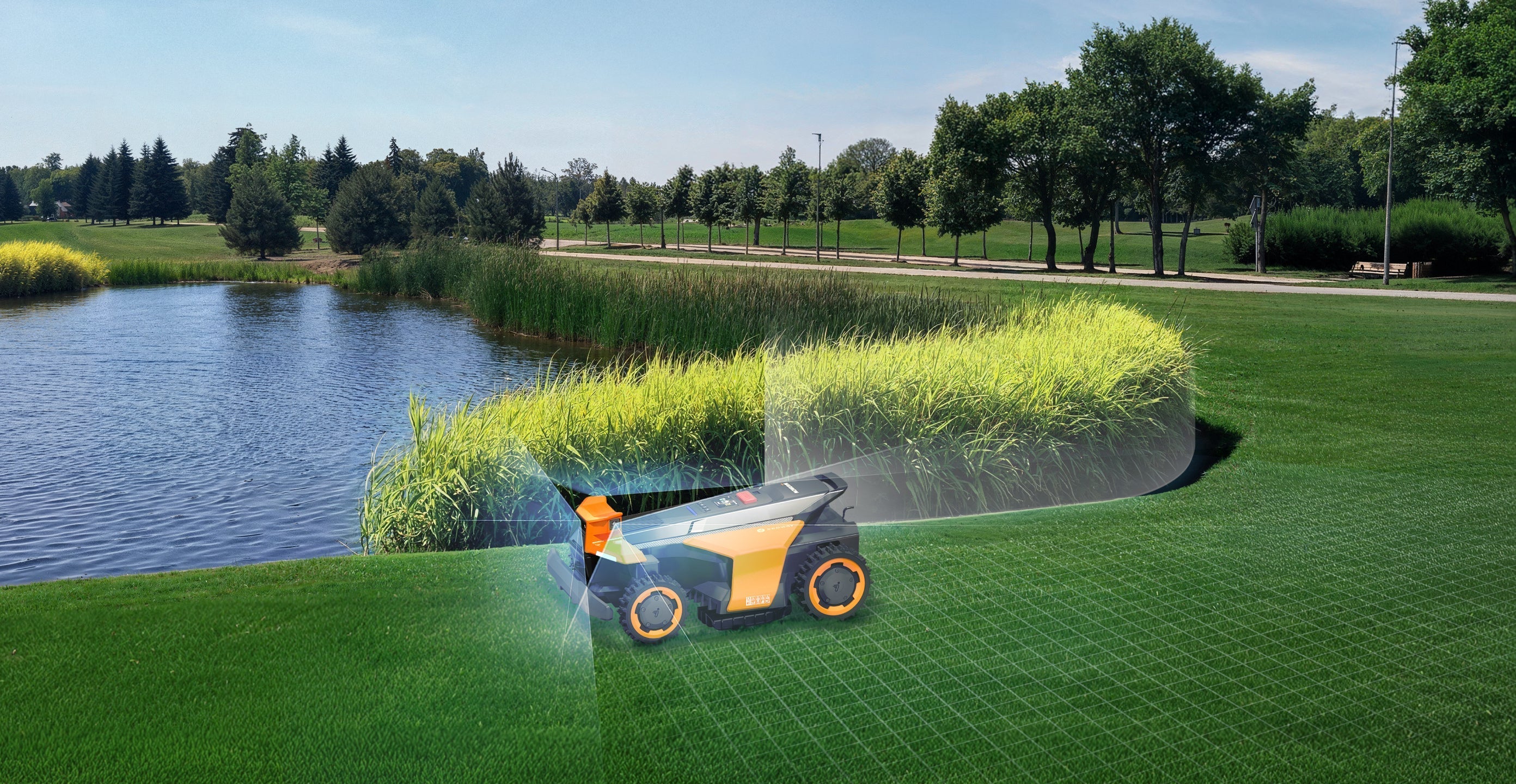 Navimow i105E robot lawn mower mows grass by the water.