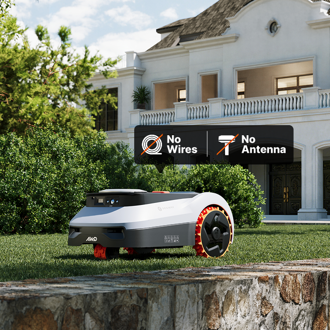Segway Navimow i110N robot lawn mower on the green grass.