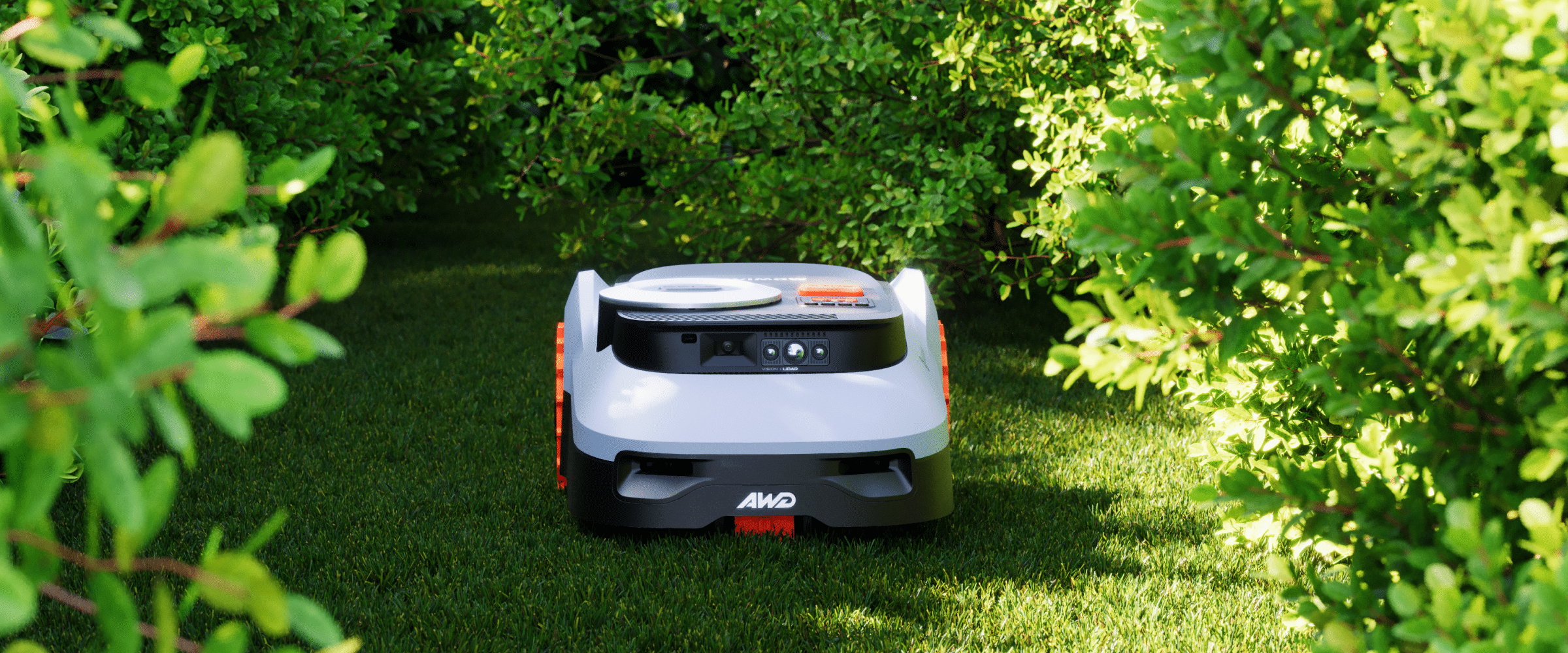 Segway Navimow H series AWD robot lawn mower on green grass.