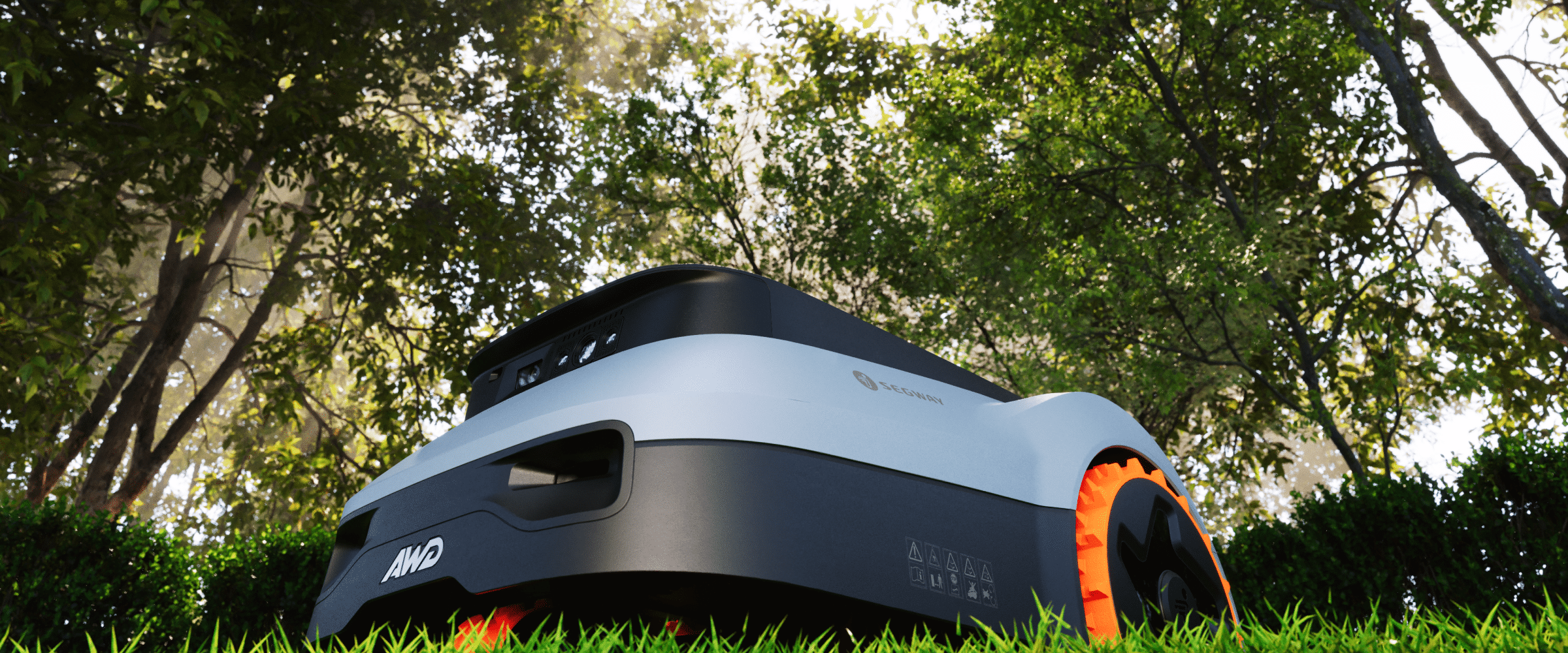 A Segway Navimow i105E AWD robot lawn mower on grass.