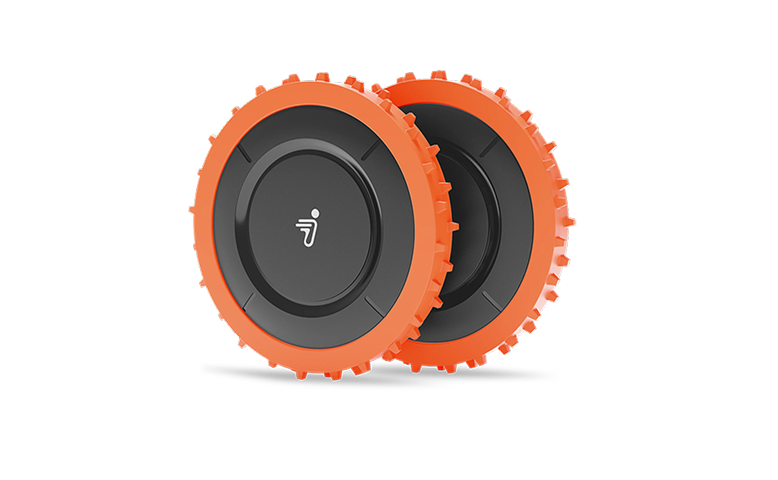 Navimow i110N robot lawn mower has two orange spiked wheels.