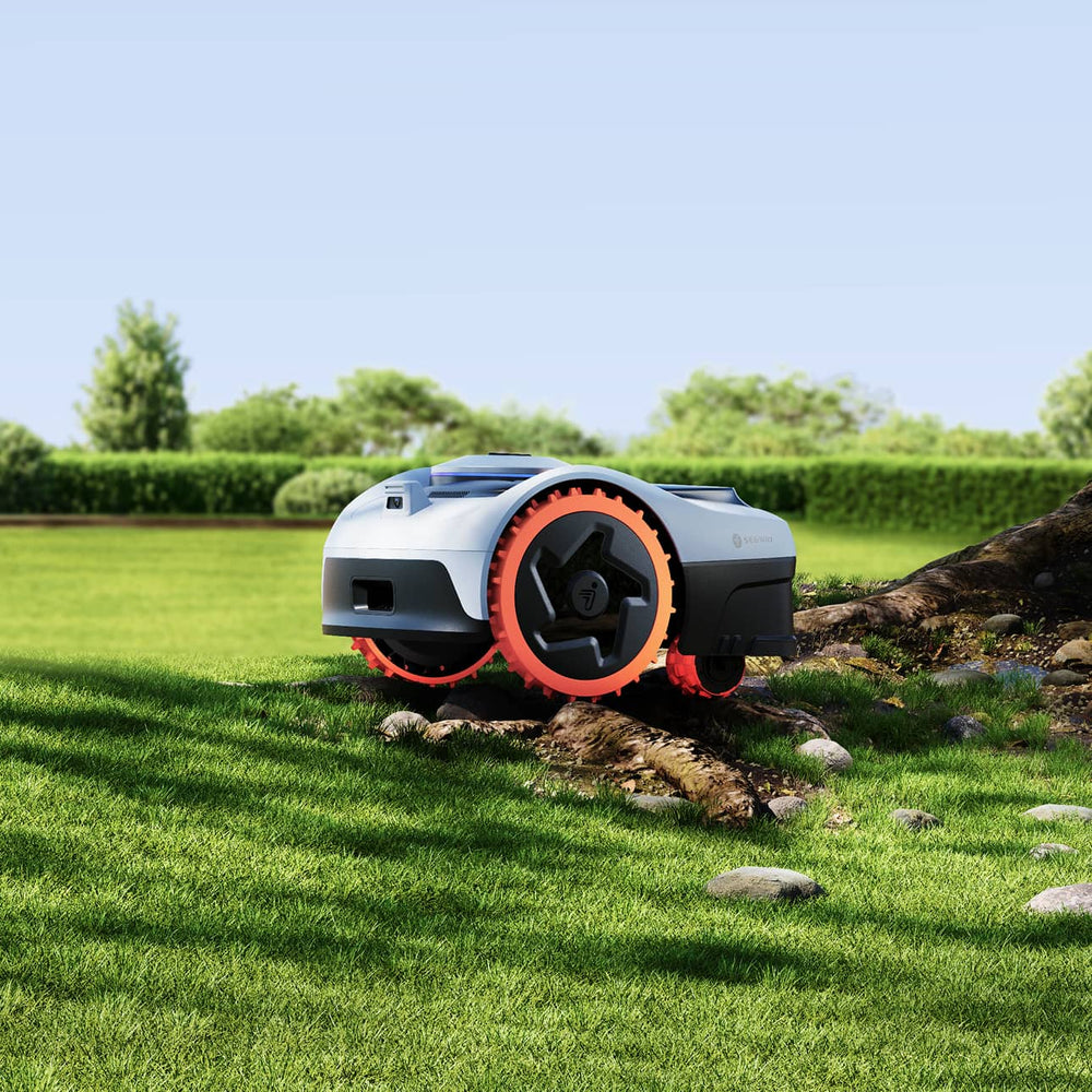 Segway Navimow i110N robot lawn mower on the green grass.